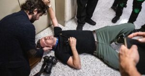 Press Freedom Under Fire: ICE Confrontation Leaves Photojournalist Hospitalized in Federal Building